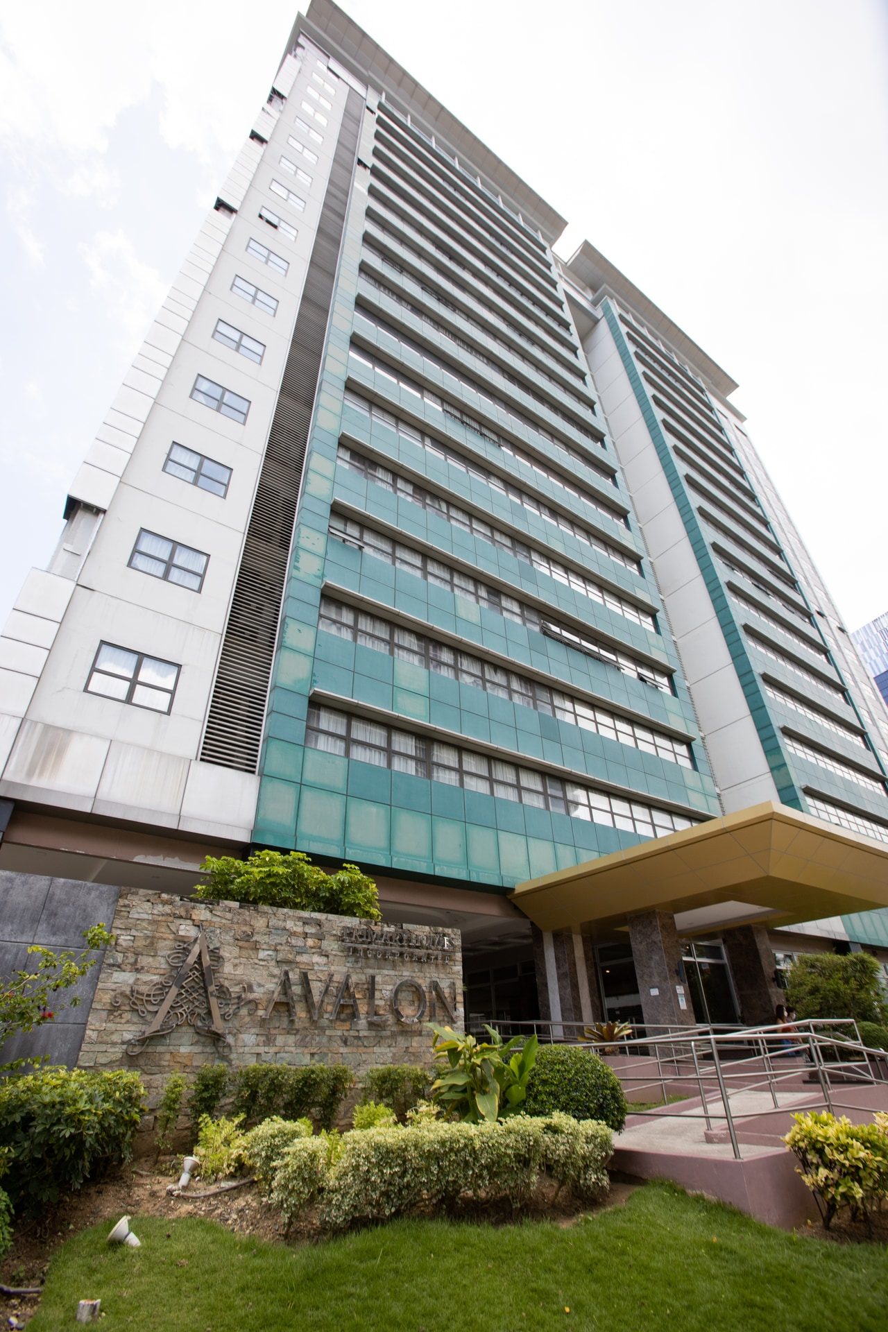 Avalon Condominium tower, landscaped entrance and Avalon sign on Luzon Avenue in Cebu City